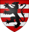 blason du village, un lion noir sur bandes rouges et blanches